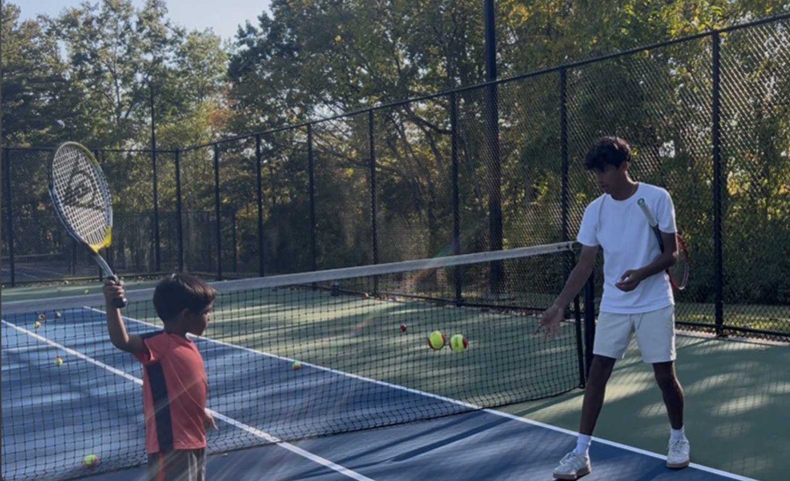 Coach Anay training on court